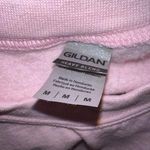 Pink Lily “Merry” Pink Christmas Sweatshirt with Red Writing Photo 1