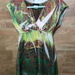 Fleurish  SIZE SMALL SURPLICE PEPLUM SHEER TOP Photo 0