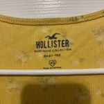 Hollister COPY -  yellow with flower print baby tee in xs Photo 6
