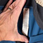 Fabletics  Blue Black Athletic Leggings Capri Cropped Zip Pocket Womens Size S Photo 1