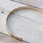 Almost A Brassy Shade of Gold Tone Cuff Bracelet Photo 7