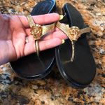 Alexander McQueen  Metallic Gold Skull Sand… Photo 5