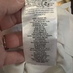 Guess NWT White Off-Shoulder Top with Gold Logo Photo 9