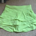Athleta  neon yellow golf athletic skirt Photo 0
