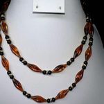 Monet Vintage  Faux Amber and Black Plastic Bead Barrel Closure Necklace 36” Photo 2