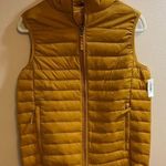 Amazon essentials, puffy vest, extra small new with tags. Size XS Photo 0