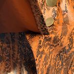 Haute Monde  Black and Orange Patterned pleather skort small Photo 6