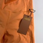 Girlfriend Collective  • NWT High Rise Bike Shorts Women's Orange Shorts Photo 6