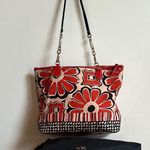 Coach poppy orange and Black Tote Bag with Striking Floral Design unique strap Photo 0