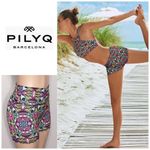 PilyQ  Lotus yoga shorts. NWOT Photo 1