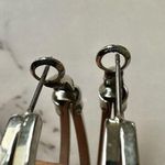 Silver tone double hoop earrings Photo 5