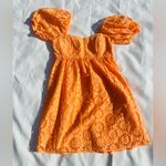 Lilly Pulitzer Kay Babydoll EYELET Dress Cantaloupe Oversize Pinwheel Sz 6 Photo 2
