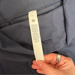 Lululemon ‘Wunder Train High-Rise Tight 25" *Hem Slit’ in True Navy, size 10 Photo 7