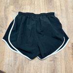 Nike | Tempo Dri-FIT Women's Athletic Performance Mid-Rise Running Shorts Photo 3