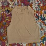 Dynamic  sleeveless turtleneck top Photo 0