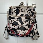 Faux leather fun Cow Print Backpack with colorful strap Photo 0