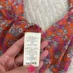 Free People NEW NWT  nina printed top in tulip ditsy orange floral bell sleeve Photo 7