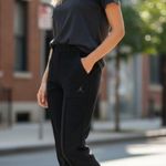 Jordan NWT $110  Women's Woven Pants Zip Cuff Large Photo 0