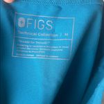 FIGS Women's Teal Short Sleeve Top Photo 3