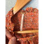 Free People  Lela Floral Smocked Ruffle Blouse Coral Size Medium Boho Sheer Photo 3