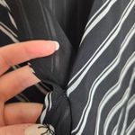 Bebe Black and White Striped Sleeveless Bodysuit Photo 3