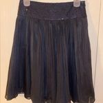 Black knee length skirt with sequin waistband and sheer overlay Photo 2