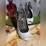 Colin Stuart  White Black Heels Photo 2