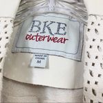 BKE Faux Leather Laser Cut Cream Cropped Open Draped Jacket Photo 1