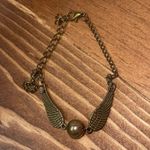 Harry Potter golden snitch bracelet
Any questions just let us know Photo 2
