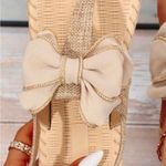 None Elegant Beige Sandals with Flower Accent Photo 1