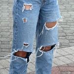 Forever 21 Lightwash distressed jeans Photo 1