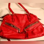 Jessica Simpson Red Shoulder Bag with Textured Leather and Modern Zipper Design Photo 0