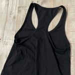 Next Level Women’s Ideal T by  Black Medium Down to Fiesta Razorback Tank Top Photo 3