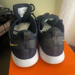 Nike womens flex trainer sneaker black metallic gold womens size 8.5 Photo 2