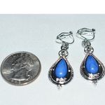 Source Unknown NWOT Exciting Blue Stone Inset Silver Tone Rhinestone Accent Clip On Earrings Photo 1
