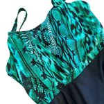 Jaclyn Smith  Teal and Black One-Piece Swimsuit Photo 2