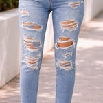 American Eagle  High Rise Distressed Mom Jeans Raw Hem Stretch size 6 Photo 0