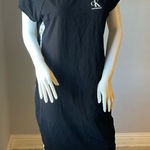 Calvin Klein  dress size Large 
In great condition 
Stretchy 
Logo on both sides Photo 0