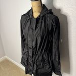Torrid Black Nylon Rain Jacket Hooded Windbreaker Size 00 M Packable Adjustable Photo 1