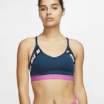 Nike The Indy Sports Bra in teal and pink Photo 0