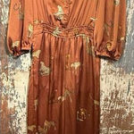 Umgee NWT  V-neck Jumpsuit, animal print, size Small Photo 0