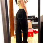 High waist black jeans with pockets both in the front and back. Only worn once. Size 2. I’m 5 ft and normally wear size XS Photo 1