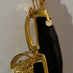 Elegant Gold and Black Golf Bag Brooch. Photo 0