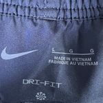 Nike NWT  Dri FIT Training Shorts Navy Blue Womens Size L Standard Fit 7 Inseam Photo 4