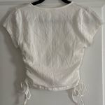 Brandy Melville John Galt White Short Sleeve Cinched Cotton Wrap Top Photo 3