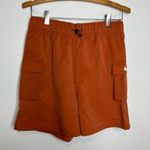 Nike loose fit high rise cargo shorts orange rust women’s size small new casual Photo 3