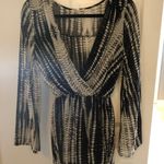 Vestique Romper Photo 0