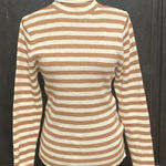 7 Love metallic brown & cream turtleneck sweater- Size Large***refer to measurements for size. Gently Warn and excellent condition. Measurements approximately from armpit to armpit 15” not fully stretched out x 23” long. None smoking home. Priced at as is condition. Don’t like my price make a reasonable offer! And thank you for checking my closet! Photo 0