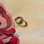 Small Heart Shaped Huggie Earrings Photo 0