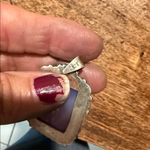 None sterling silver pendant with a rectangular moonstone ornate bezel setting. Photo 2